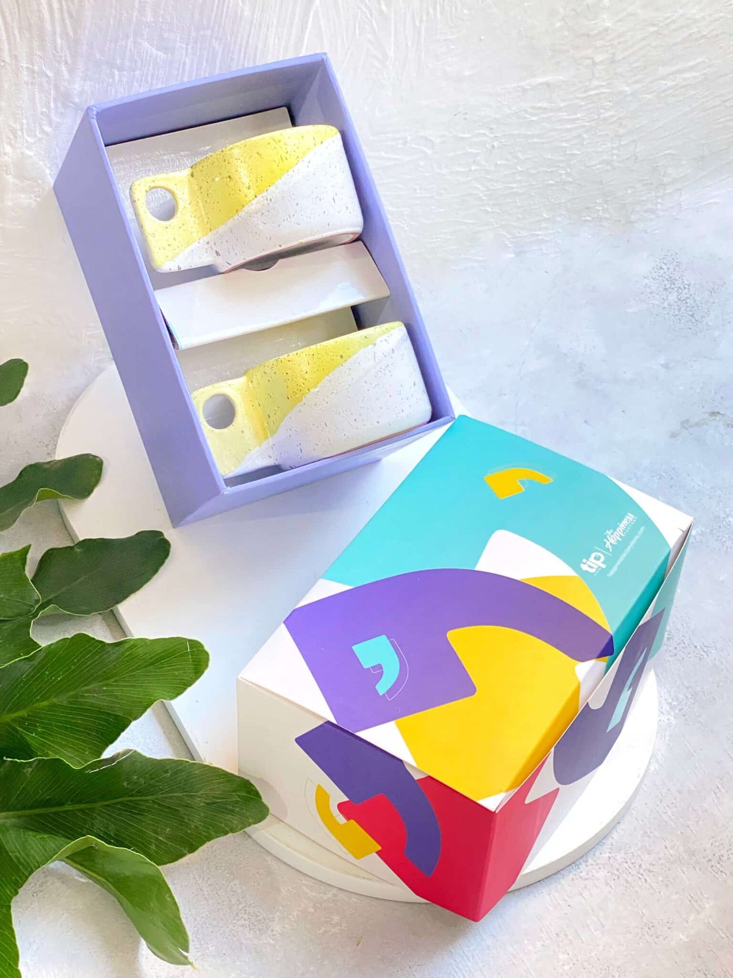 2 yellow espresso cups